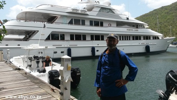 Josef Schable in Marigot, St. Lucia admiring Superyacht, Positive Carry.